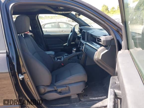 2024 Toyota Tacoma SR5 with VIN 3TMLB5JN4RM068147, listed as a IAAI auction lot 43177753 with 15,469 mi miles and . Bid and sale history available at DreamBid. Image 5.