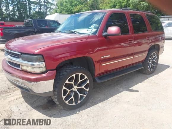 2002 Chevrolet Tahoe LS with VIN 1GNEC13Z72R221596, listed as a IAAI auction lot 42585905 with 248,548 mi miles and . Bid and sale history available at DreamBid. Image 2.