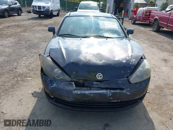 2008 Hyundai Tiburon GS с VIN KMHHM66D78U295358, выставлен на аукционе IAAI как лот 43276888 с пробегом 198 805 миль миль и . История ставок и продаж доступна на DreamBid. Изображение 6.