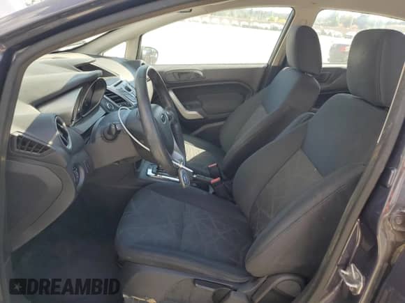 2012 Ford Fiesta SES z VIN 3FADP4FJ5CM159043, wystawiony jako Copart lot #70961895 z przebiegiem 37 556 mil mil oraz Czysty tytuł • Clean title. Historia ofert i sprzedaży dostępna na DreamBid. Obrazek 7.