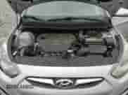 2014 Hyundai Accent GLS z VIN KMHCT4AE0EU766070, wystawiony jako Copart lot #82329165 z przebiegiem 137 947 mil mil oraz Szkoda całkowita • Salvage title. Historia ofert i sprzedaży dostępna na DreamBid. Obrazek 11.