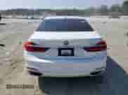 2017 BMW 7 Series 740i with VIN WBA7E2C5XHG739931, listed as a Copart auction lot 81453395 with 121,438 mi miles and Clean title. Bid and sale history available at DreamBid. Image 6.