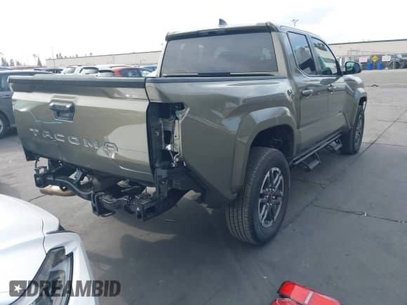 2024 Toyota Tacoma SR5 with VIN 3TMLB5JN1RM043397, listed as a IAAI auction lot 42181997 with 9,254 mi miles and . Bid and sale history available at DreamBid. Image 4.