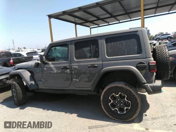 2022 Jeep Wrangler Unlimited Rubicon с VIN 1C4JJXR60NW182756, выставлен на аукционе IAAI как лот 36927414 с пробегом Не указан миль и . История ставок и продаж доступна на DreamBid. Изображение 14.