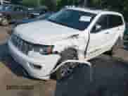 2017 Jeep Grand Cherokee Overland with VIN 1C4RJFCG1HC633004, listed as a IAAI auction lot 42672905 with 138,018 mi miles and . Bid and sale history available at DreamBid. Image 2.