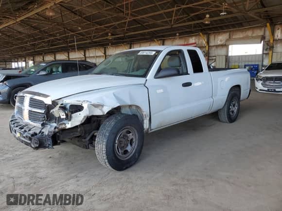 2005 Dodge Dakota ST with VIN 1D7HE22K75S169335, listed as a Copart auction lot 69614255 with 241,972 mi miles and Salvage title. Bid and sale history available at DreamBid. Image 1.