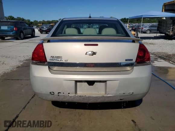 2011 Chevrolet Impala LT Retail with VIN 2G1WB5EKXB1333897, listed as a Copart auction lot 70126975 with 178,398 mi miles and Salvage title. Bid and sale history available at DreamBid. Image 6.