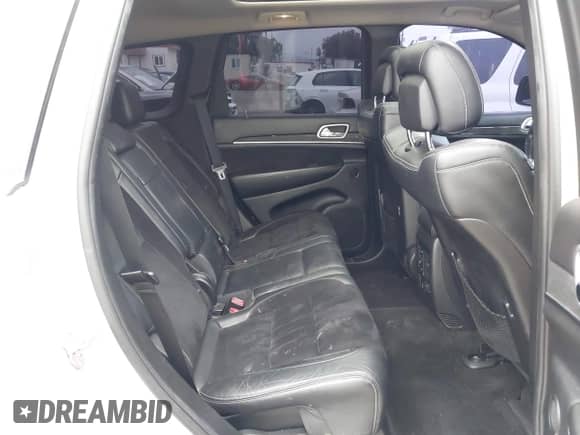 2012 Jeep Grand Cherokee SRT-8 z VIN 1C4RJFDJXCC205788, wystawiony jako IAAI lot #42047300 z przebiegiem 137 348 mil mil oraz . Historia ofert i sprzedaży dostępna na DreamBid. Obrazek 8.