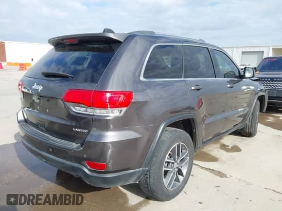 2018 Jeep Grand Cherokee Laredo z VIN 1C4RJEAG7JC450922, wystawiony jako IAAI lot #41169294 z przebiegiem 158 689 mil mil oraz . Historia ofert i sprzedaży dostępna na DreamBid. Obrazek 4.