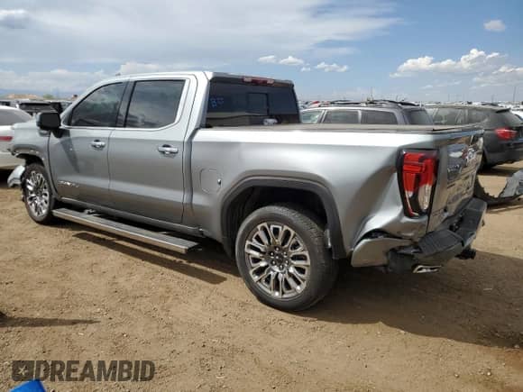 2025 GMC Sierra 1500 Denali Ultimate with VIN 1GTUUHE80SZ106868, listed as a Copart auction lot 54515645 with 1,467 mi miles and Salvage title. Bid and sale history available at DreamBid. Image 2.