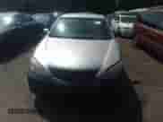 2002 Toyota Camry LE z VIN 4T1BE30K42U572872, wystawiony jako IAAI lot #37272664 z przebiegiem 238 015 mil mil oraz . Historia ofert i sprzedaży dostępna na DreamBid. Obrazek 6.