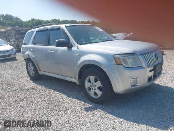 2008 Mercury Mariner with VIN 4M2CU91128KJ12970, listed as a IAAI auction lot 42940612 with 201,682 mi miles and . Bid and sale history available at DreamBid. Image 1.