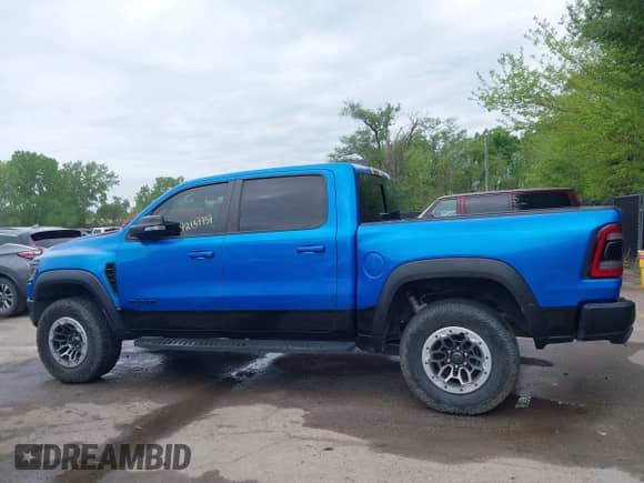 2021 Ram 1500 TRX with VIN 1C6SRFU94MN812802, listed as a IAAI auction lot 42137737 with 43,794 mi miles and . Bid and sale history available at DreamBid. Image 15.