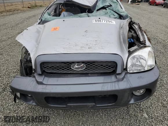 2003 Hyundai Santa Fe GLS с VIN KM8SC73D03U458797, выставлен на аукционе Copart как лот 69877294 с пробегом Не указан миль и Списание • Salvage title. История ставок и продаж доступна на DreamBid. Изображение 12.