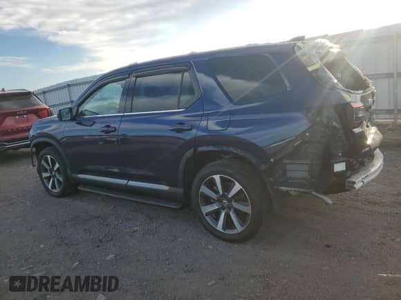 2023 Honda Pilot Touring with VIN 5FNYG1H72PB050769, listed as a Copart auction lot 84801165 with 19,829 mi miles and Salvage title. Bid and sale history available at DreamBid. Image 2.