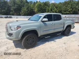 2022 Toyota Tacoma SR с VIN 3TYCZ5AN5NT099109, выставлен на аукционе Copart как лот 70888475 с пробегом 100 190 миль миль и Списание • Salvage title. История ставок и продаж доступна на DreamBid. Изображение 1.