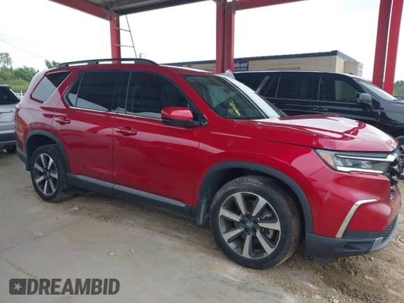 2023 Honda Pilot Elite z VIN 5FNYG1H84PB039720, wystawiony jako IAAI lot #42429896 z przebiegiem 37 988 mil mil oraz . Historia ofert i sprzedaży dostępna na DreamBid. Obrazek 13.