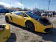 2014 Lamborghini Gallardo с VIN ZHWGU5BZ7ELA13923, выставлен на аукционе Copart как лот 82374714 с пробегом 33 260 миль миль и Списание • Salvage title. История ставок и продаж доступна на DreamBid. Изображение 4.