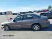 2003 Hyundai Sonata with VIN KMHWF25S03A877600, listed as a IAAI auction lot 42247620 with 85,392 mi miles and . Bid and sale history available at DreamBid. Image 15.