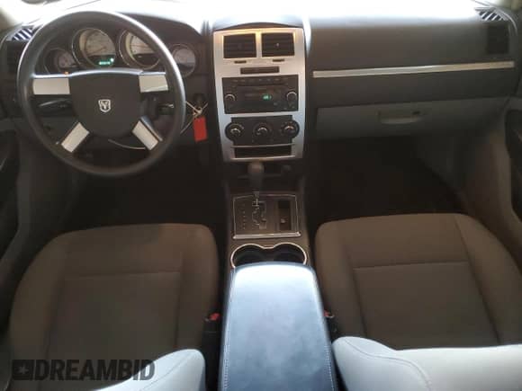 2009 Dodge Charger SE with VIN 2B3KA43D39H505990, listed as a Copart auction lot 71044214 with 223,573 mi miles and Salvage title. Bid and sale history available at DreamBid. Image 8.