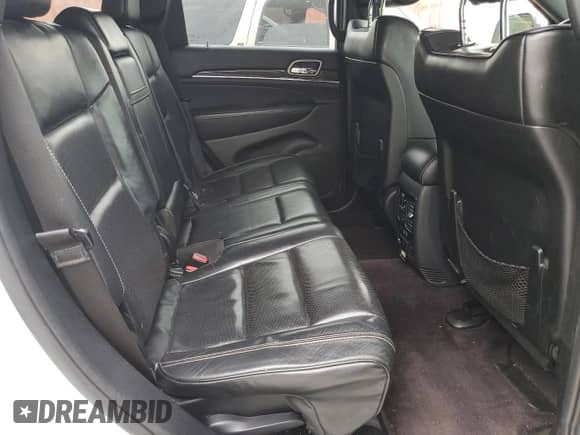 2017 Jeep Grand Cherokee Overland with VIN 1C4RJECG1HC773855, listed as a Copart auction lot 70180755 with 123,525 mi miles and Salvage title. Bid and sale history available at DreamBid. Image 11.