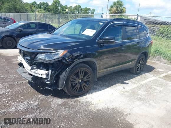 2022 Honda Pilot Special Edition with VIN 5FNYF5H21NB011652, listed as a IAAI auction lot 42772962 with 69,046 mi miles and . Bid and sale history available at DreamBid. Image 17.