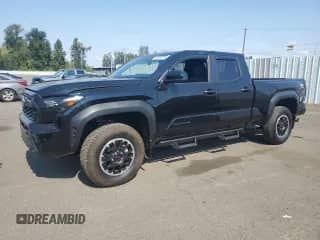 2024 Toyota Tacoma SR5 with VIN 3TMLB5JN9RM036603, listed as a Copart auction lot 80685075 with 4,301 mi miles and Salvage title. Bid and sale history available at DreamBid. Image 1.