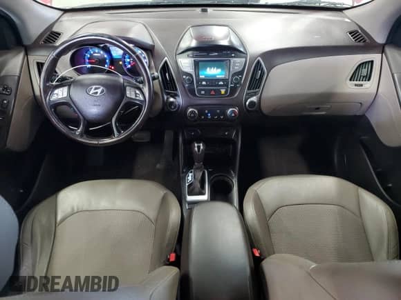 2015 Hyundai Tucson SE z VIN KM8JUCAG6FU974956, wystawiony jako Copart lot #69148475 z przebiegiem 99 898 mil mil oraz Czysty tytuł • Clean title. Historia ofert i sprzedaży dostępna na DreamBid. Obrazek 8.