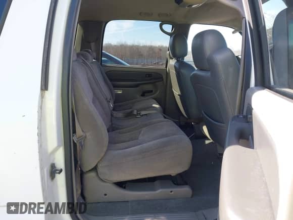 2003 Chevrolet Suburban LT z VIN 3GNEC16Z53G284144, wystawiony jako IAAI lot #41548920 z przebiegiem 423 602 mil mil oraz . Historia ofert i sprzedaży dostępna na DreamBid. Obrazek 8.