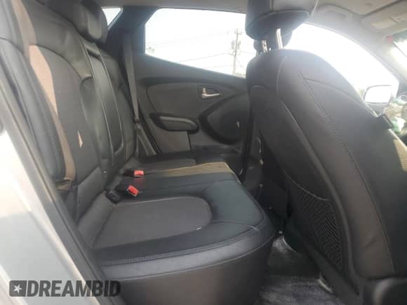 2012 Hyundai Tucson GLS z VIN KM8JU3AC6CU460095, wystawiony jako Copart lot #71960445 z przebiegiem 124 146 mil mil oraz Szkoda całkowita • Salvage title. Historia ofert i sprzedaży dostępna na DreamBid. Obrazek 11.