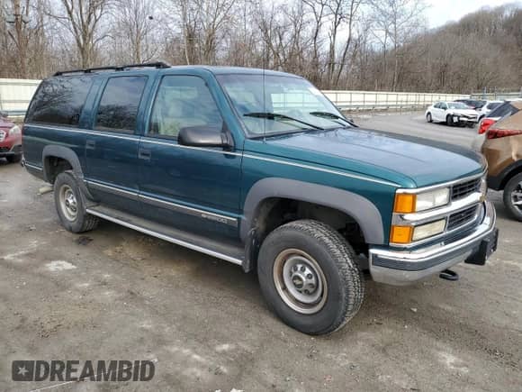 1995 Chevrolet Suburban с VIN 1GNGK26K8SJ406190, выставлен на аукционе Copart как лот 84103234 с пробегом 145 731 миль миль и Чистый • Clean title. История ставок и продаж доступна на DreamBid. Изображение 4.