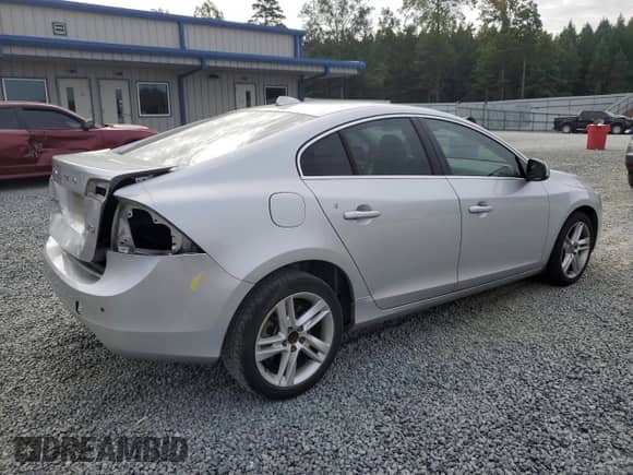 2015 Volvo S60 T5 Drive-E Premier with VIN YV140MFK9F2357136, listed as a Copart auction lot 80853495 with 106,284 mi miles and Salvage title. Bid and sale history available at DreamBid. Image 3.
