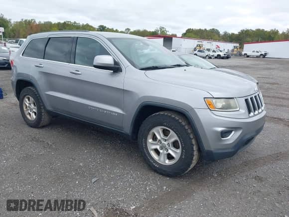 2014 Jeep Grand Cherokee Laredo z VIN 1C4RJFAG0EC251156, wystawiony jako IAAI lot #43428557 z przebiegiem 175 570 mil mil oraz . Historia ofert i sprzedaży dostępna na DreamBid. Obrazek 1.