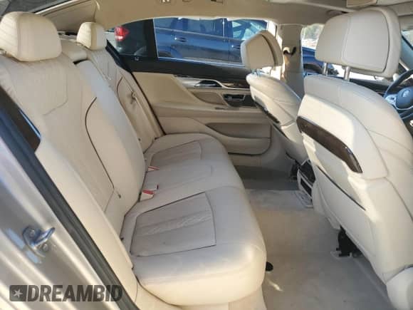 2017 BMW 7 Series 740i xDrive with VIN WBA7E4C58HGU99595, listed as a Copart auction lot 47221875 with 107,419 mi miles and Salvage title. Bid and sale history available at DreamBid. Image 10.
