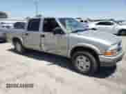 2004 Chevrolet S-10 LS z VIN 1GCDT13X14K113828, wystawiony jako Copart lot #64229655 z przebiegiem 100 013 mil mil oraz Szkoda całkowita • Salvage title. Historia ofert i sprzedaży dostępna na DreamBid. Obrazek 4.