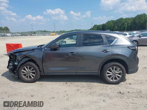 2023 Mazda CX-5 S Preferred z VIN JM3KFBCM3P0183039, wystawiony jako IAAI lot #42671736 z przebiegiem 73 559 mil mil oraz . Historia ofert i sprzedaży dostępna na DreamBid. Obrazek 14.