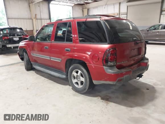 2002 Chevrolet TrailBlazer LS z VIN 1GNDS13S422292040, wystawiony jako IAAI lot #42213886 z przebiegiem 235 290 mil mil oraz . Historia ofert i sprzedaży dostępna na DreamBid. Obrazek 3.