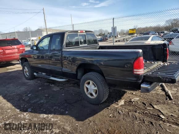 2002 Dodge Dakota с VIN 1B7GG42X52S573625, выставлен на аукционе Copart как лот 87913795 с пробегом 94 316 миль миль и Списание • Salvage title. История ставок и продаж доступна на DreamBid. Изображение 2.