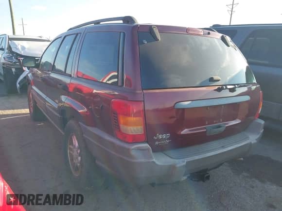 2003 Jeep Grand Cherokee Laredo z VIN 1J4GX48S83C551023, wystawiony jako IAAI lot #43186986 z przebiegiem 176 490 mil mil oraz . Historia ofert i sprzedaży dostępna na DreamBid. Obrazek 3.