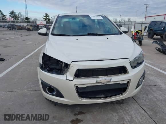 2014 Chevrolet Sonic LTZ with VIN 1G1JE5SH3E4133088, listed as a IAAI auction lot 41072056 with 143,855 mi miles and . Bid and sale history available at DreamBid. Image 6.