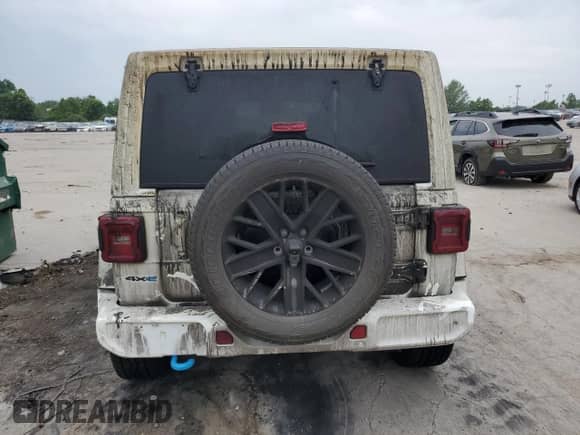 2022 Jeep Wrangler Unlimited Sahara with VIN 1C4JJXP6XNW207648, listed as a Copart auction lot 58209795 with 35,306 mi miles and Salvage title. Bid and sale history available at DreamBid. Image 6.