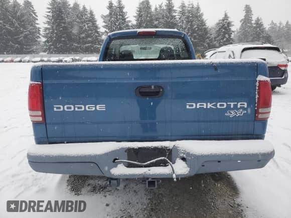 2003 Dodge Dakota с VIN 1D7HG12X23S345155, выставлен на аукционе Copart как лот 45223315 с пробегом 132 984 миль миль и Списание • Salvage title. История ставок и продаж доступна на DreamBid. Изображение 6.