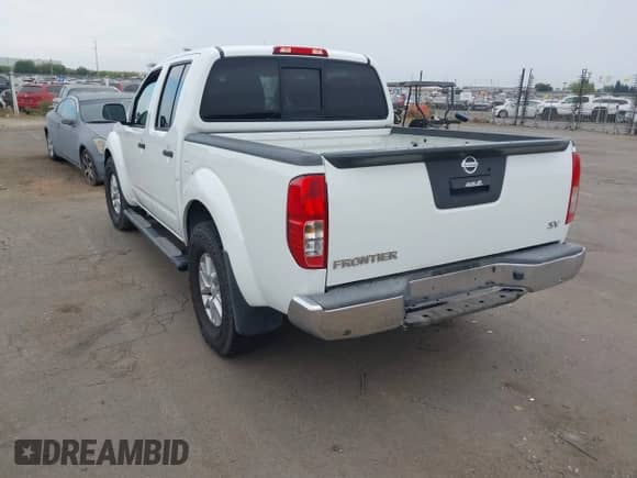 2015 Nissan Frontier SV with VIN 1N6AD0ER4FN751322, listed as a IAAI auction lot 43276518 with 124,404 mi miles and . Bid and sale history available at DreamBid. Image 3.