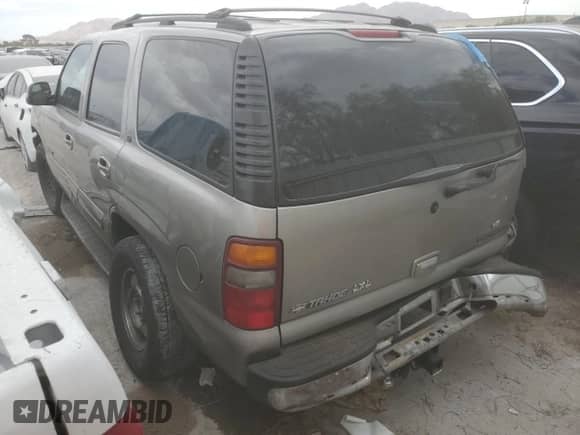 2000 Chevrolet Tahoe LS with VIN 1GNEK13T5YJ150744, listed as a Copart auction lot 71294815 with 214,737 mi miles and Salvage title. Bid and sale history available at DreamBid. Image 2.