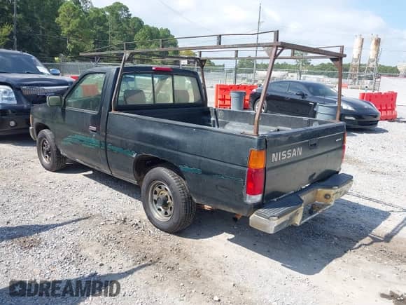 1995 Nissan Frontier z VIN 1N6SD11S6SC430018, wystawiony jako IAAI lot #43151647 z przebiegiem 193 978 mil mil oraz . Historia ofert i sprzedaży dostępna na DreamBid. Obrazek 3.