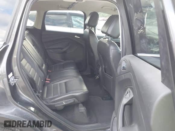 2017 Ford Escape Titanium z VIN 1FMCU9JD1HUD83745, wystawiony jako IAAI lot #43423010 z przebiegiem 257 150 mil mil oraz . Historia ofert i sprzedaży dostępna na DreamBid. Obrazek 8.