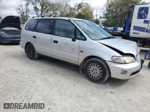 1996 Honda Odyssey with VIN RA11118375, listed as a Copart auction lot 46170125 with 185,034 mi miles and Non repairable. Bid and sale history available at DreamBid. Image 4.