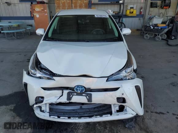 2019 Toyota Prius L Eco с VIN JTDKARFUXK3101195, выставлен на аукционе Copart как лот 82488755 с пробегом 37 486 миль миль и Списание • Salvage title. История ставок и продаж доступна на DreamBid. Изображение 5.