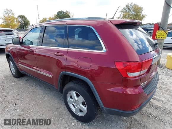 2012 Jeep Grand Cherokee Laredo with VIN 1C4RJFAGXCC256023, listed as a IAAI auction lot 43587897 with 199,803 mi miles and . Bid and sale history available at DreamBid. Image 3.