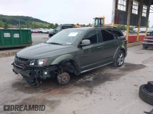 2016 Dodge Journey Crossroad Plus with VIN 3C4PDDGG7GT165022, listed as a IAAI auction lot 43026166 with 107,841 mi miles and . Bid and sale history available at DreamBid. Image 2.